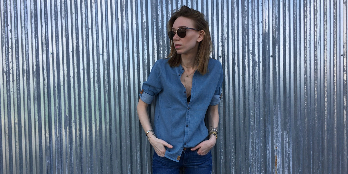 Blue button shirt outfit with sunglasses