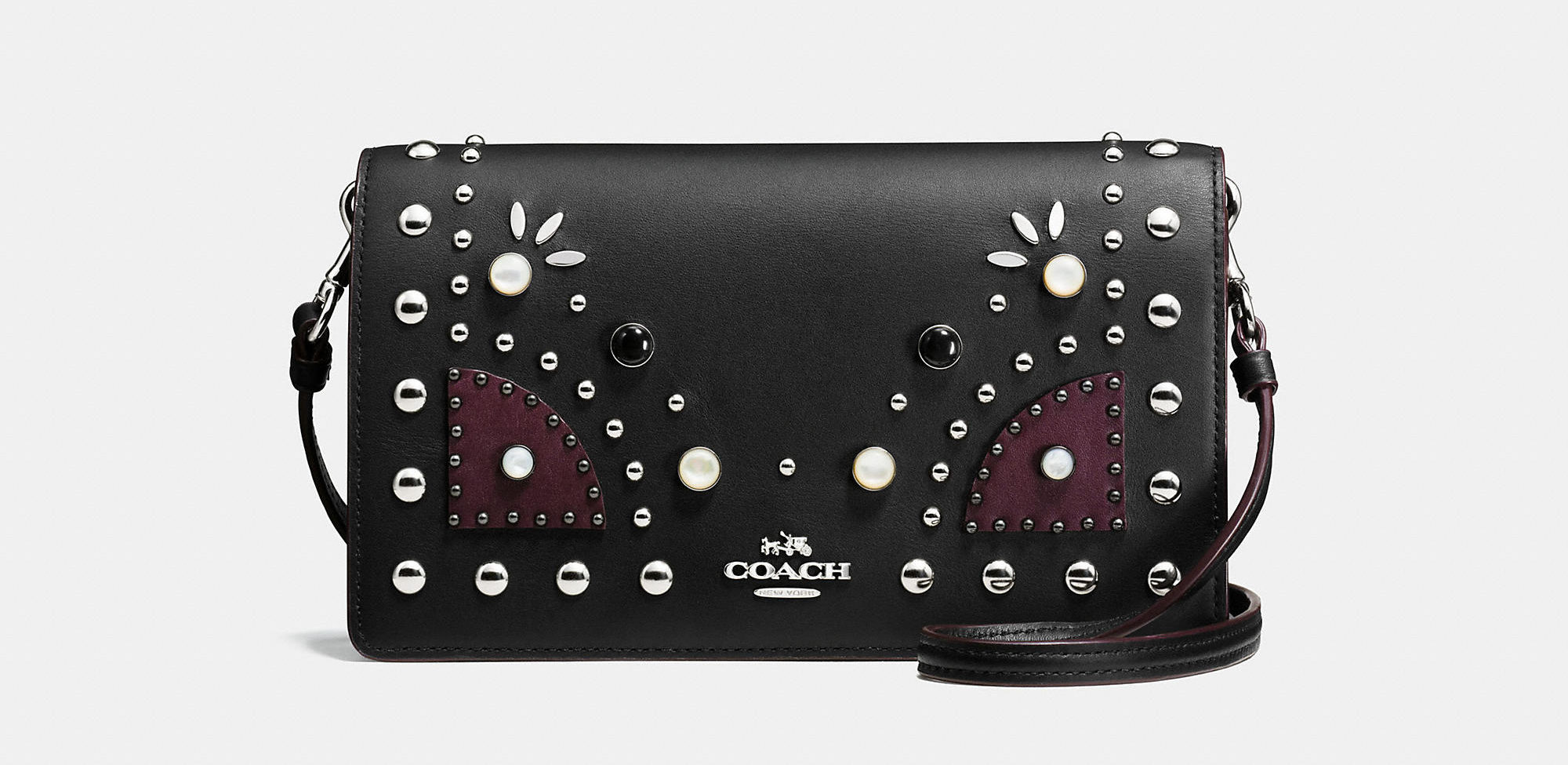 Coach studded bag in black front view