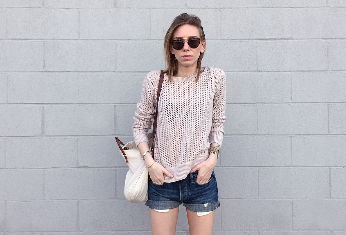 Close up pink sweater with denim shorts