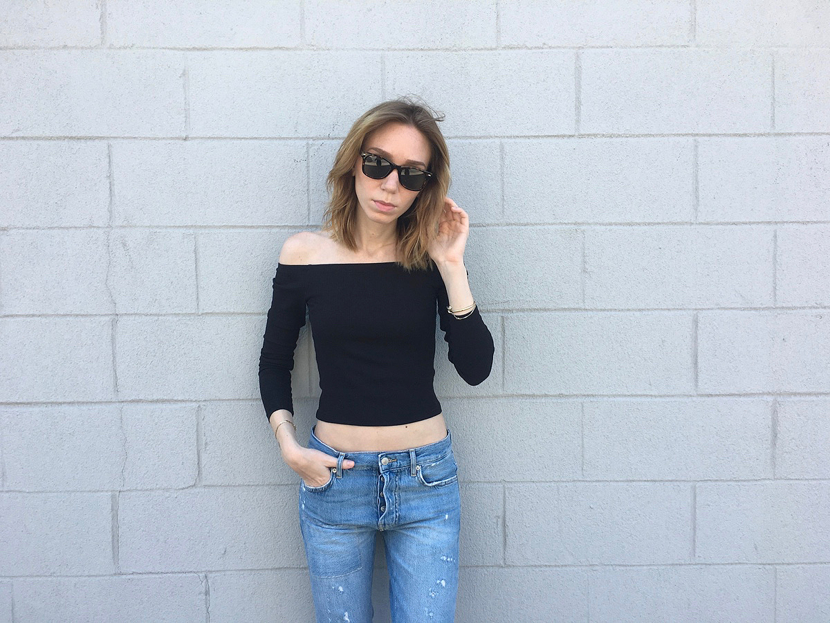 Black off the shoulder top with jeans
