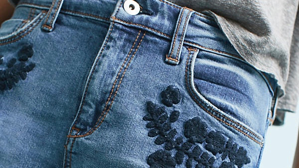 Anthropologie flower denim detail zoomed in