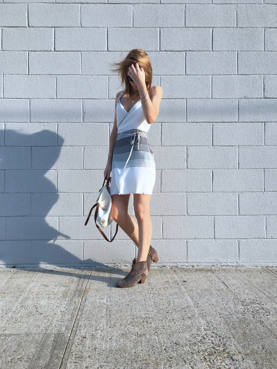white dress with blue stripes and boots outfit
