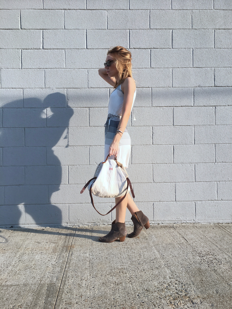Side view white dress with blue stripes and boots outfit