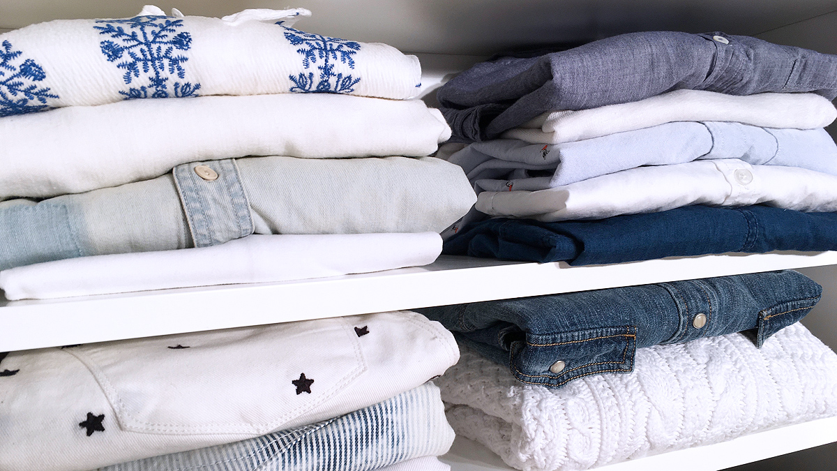 Shirts folded on shelves