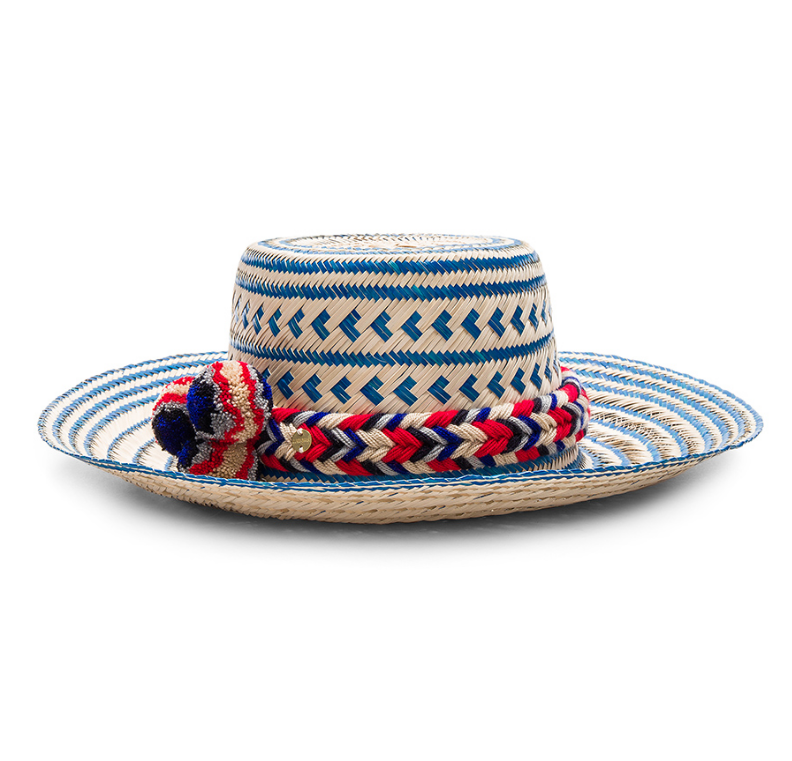Blue and cream straw hat with colorful pom poms
