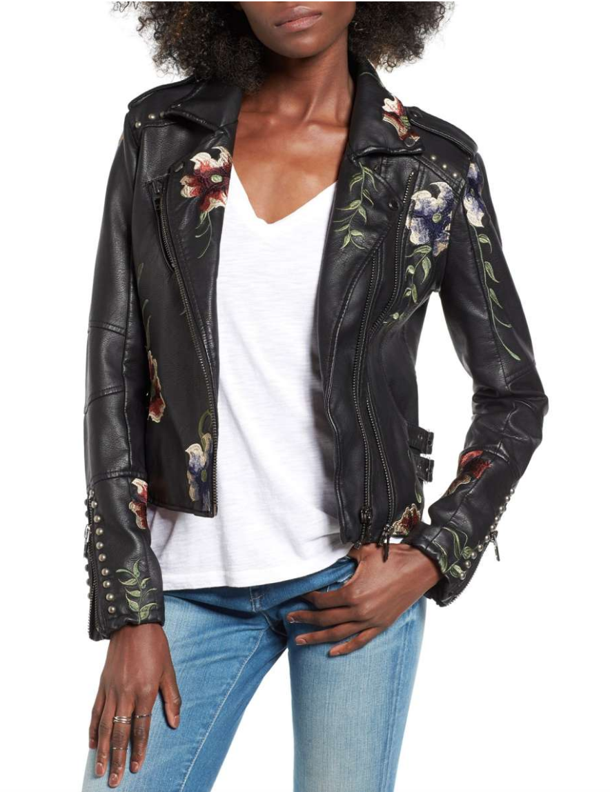 Model wearing BlankNYC black leather jacket with floral embroidery