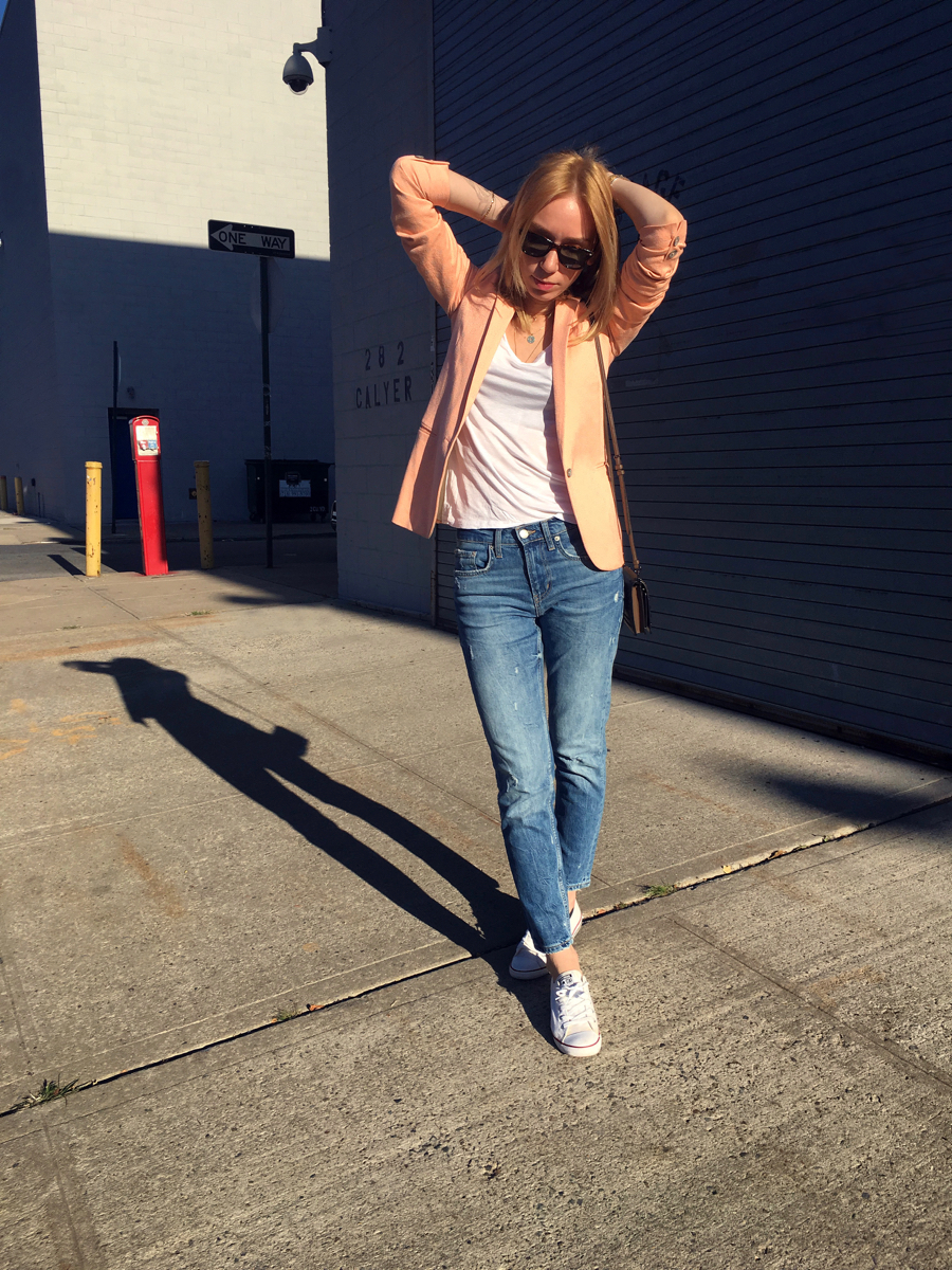 Neon colored blazer with white tee and jeans outfit