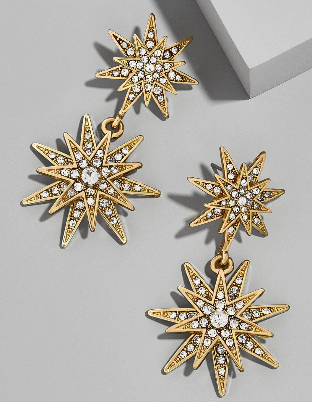 Gold star earrings from BaubleBar