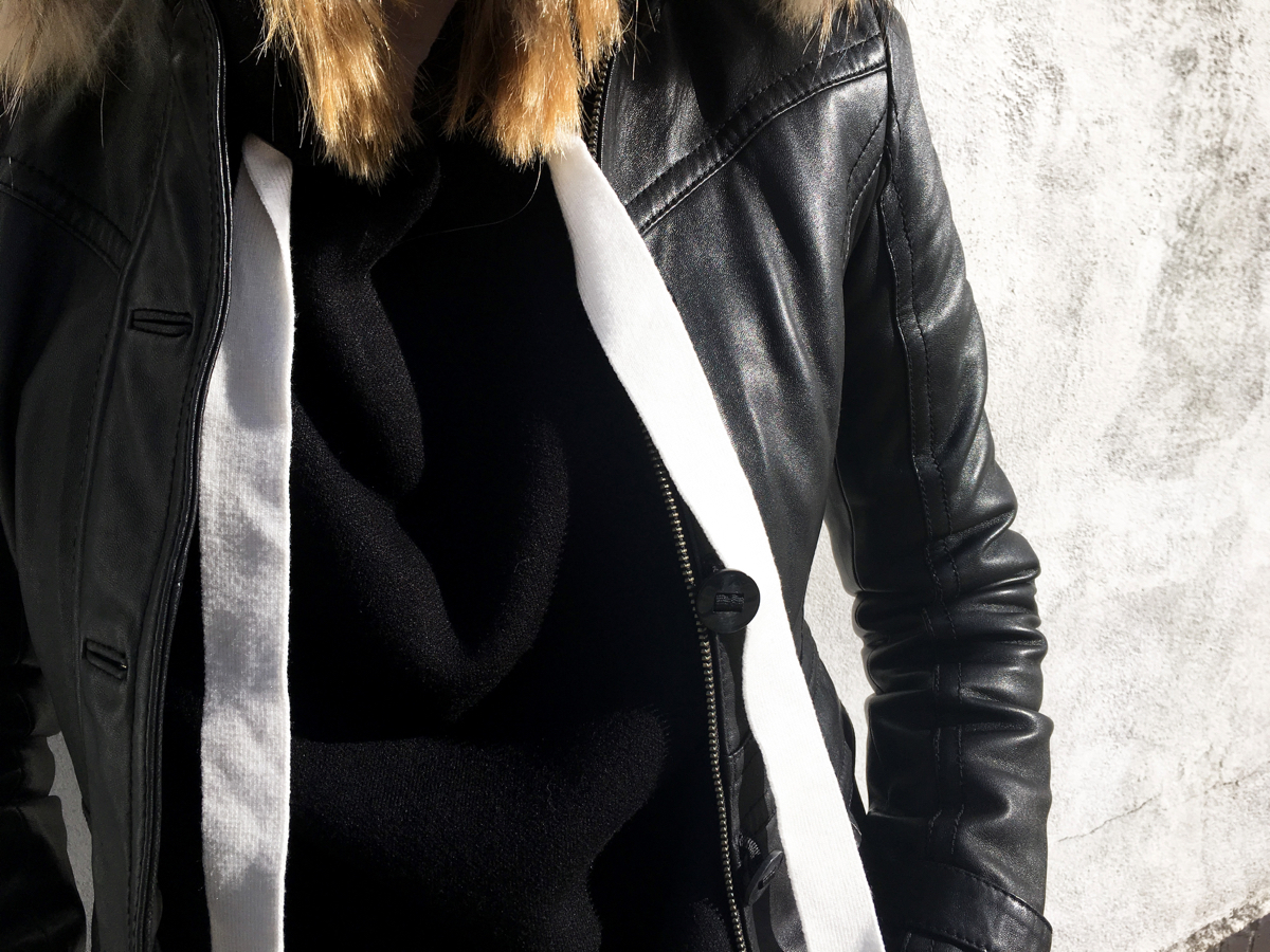 Detail shot of black leather jacket