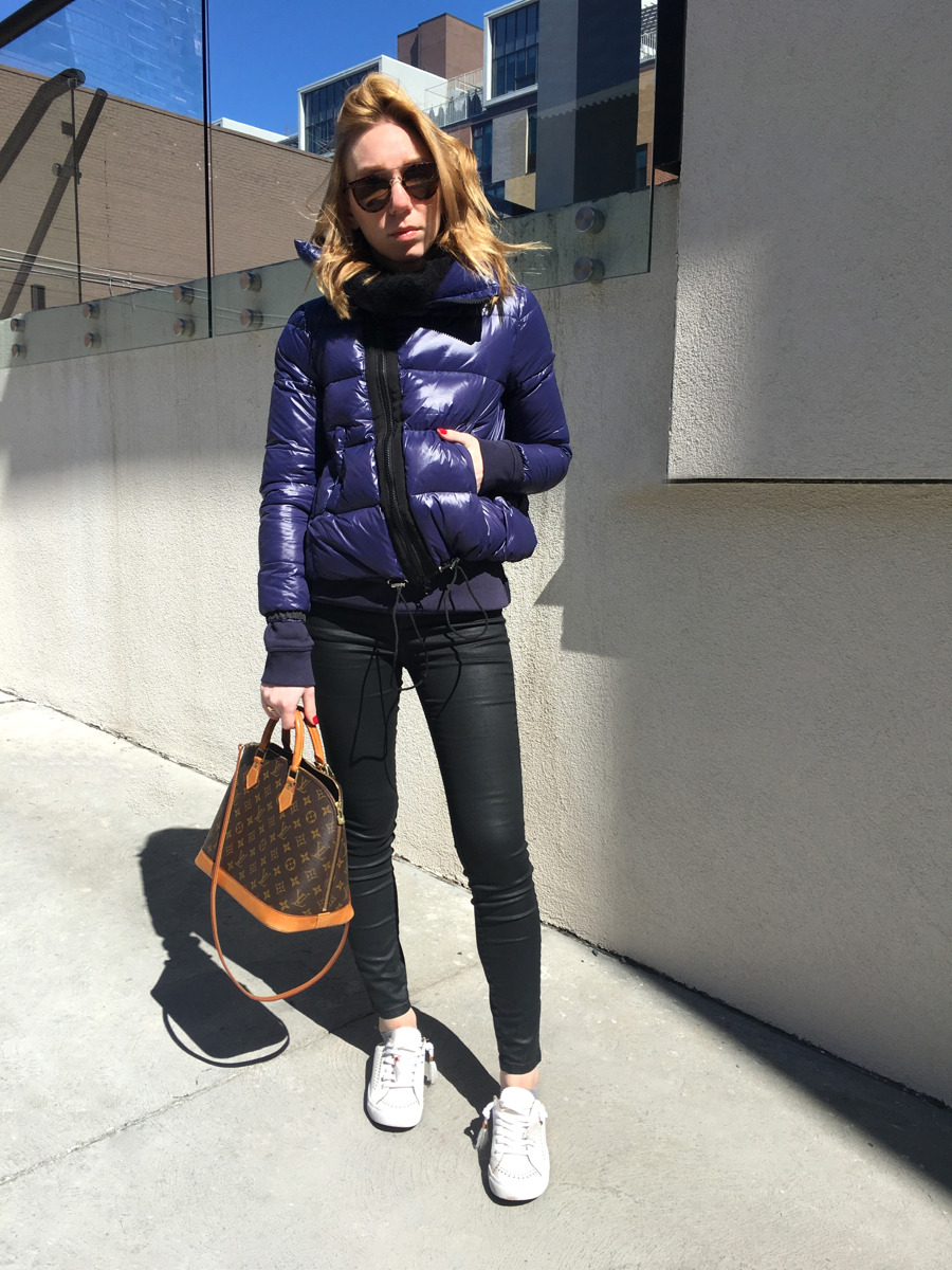 Woman posing in street wearing outfit