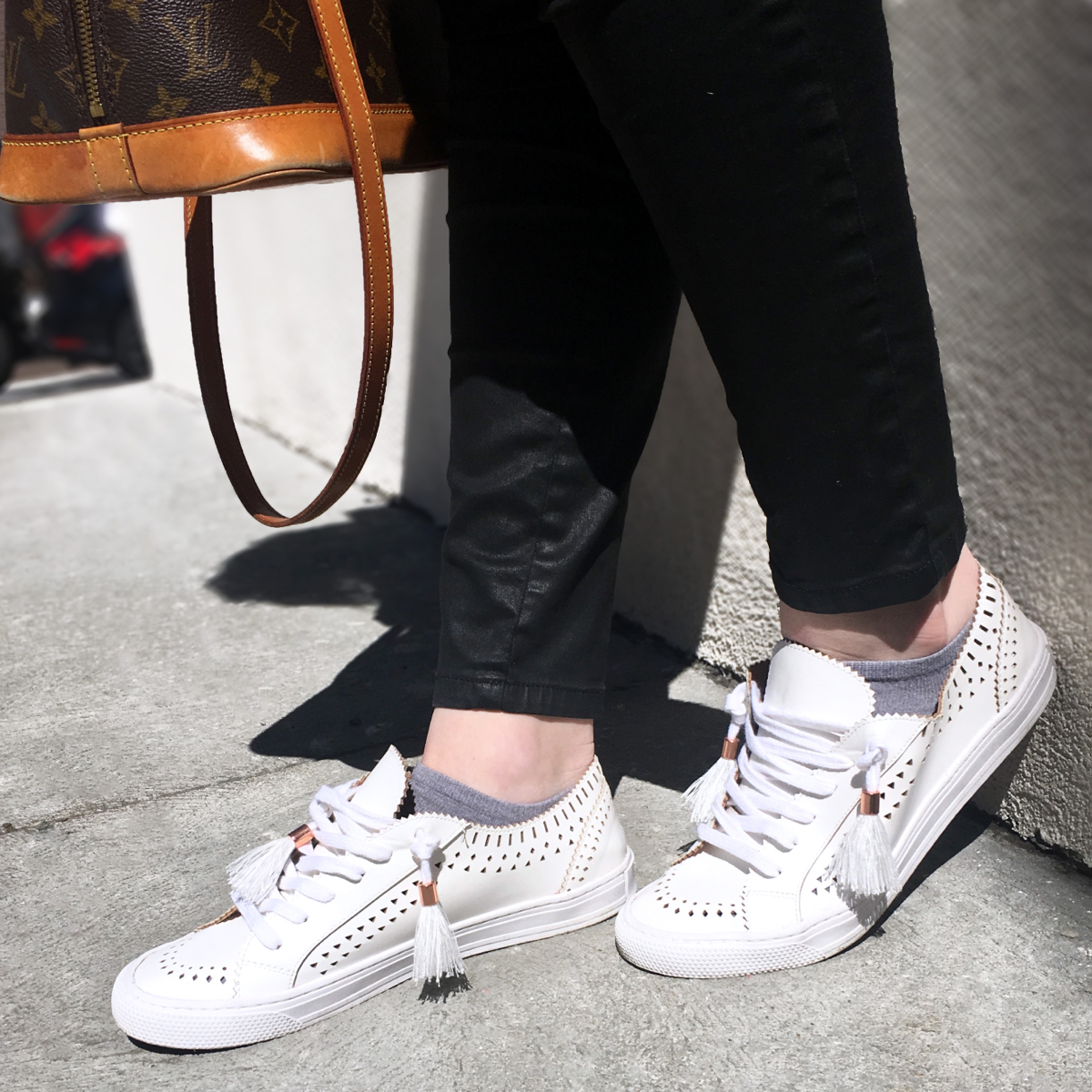 Detail shot of white sneakers