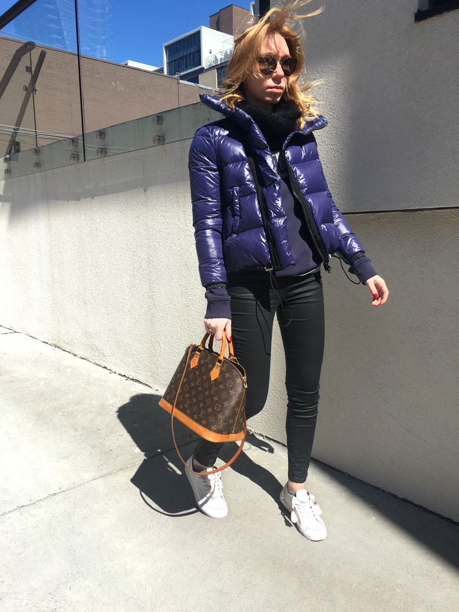 Woman posing for street style photo