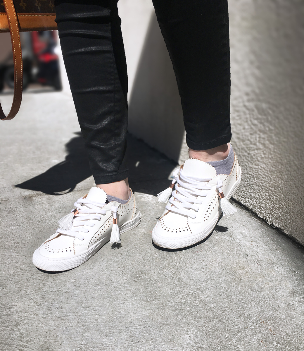 Detail shot of white sneakers