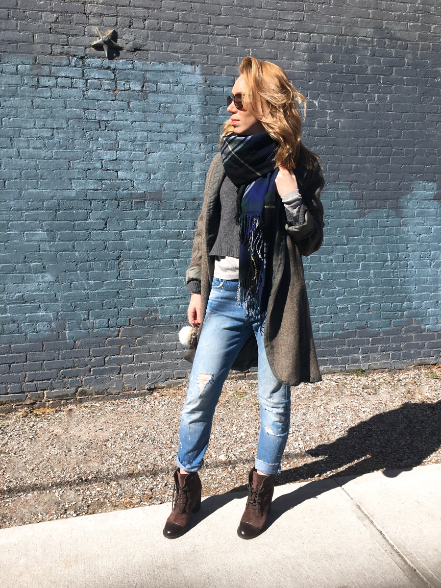 Woman looking sideways posing in outfit