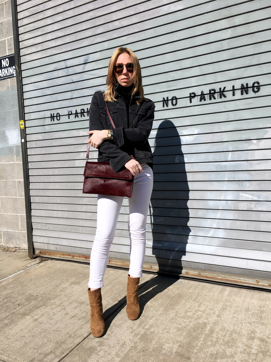 Woman posing in denim outfit
