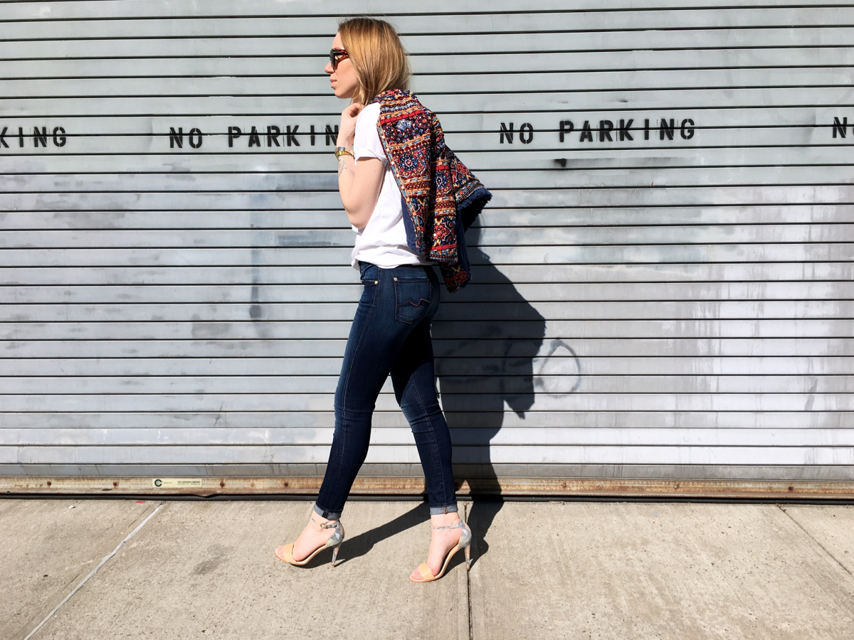Woman wearing embellished jacket outfit