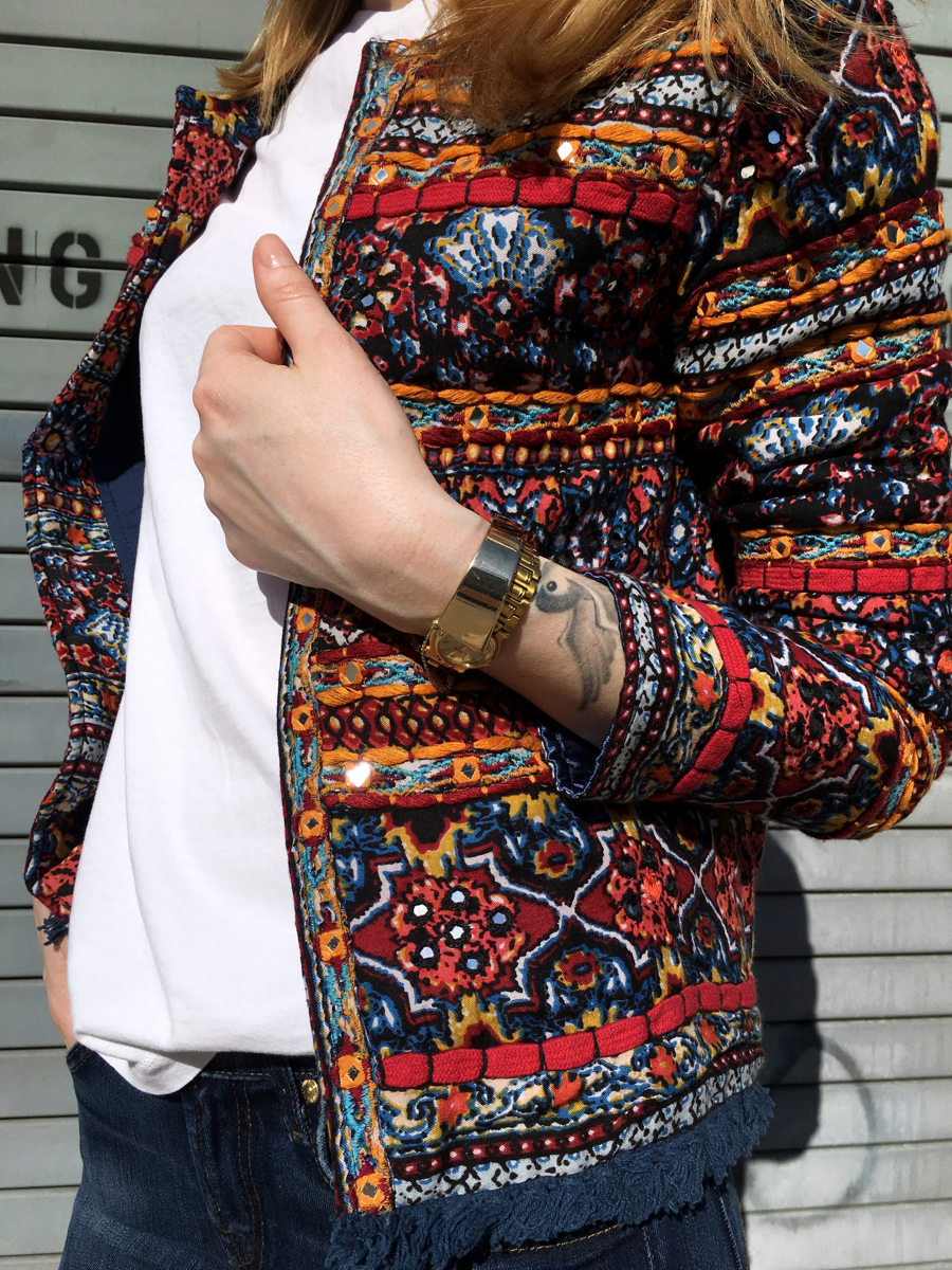 Side detail of embellished jacket