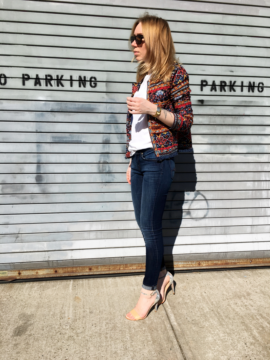 Woman posing in embellished jacket