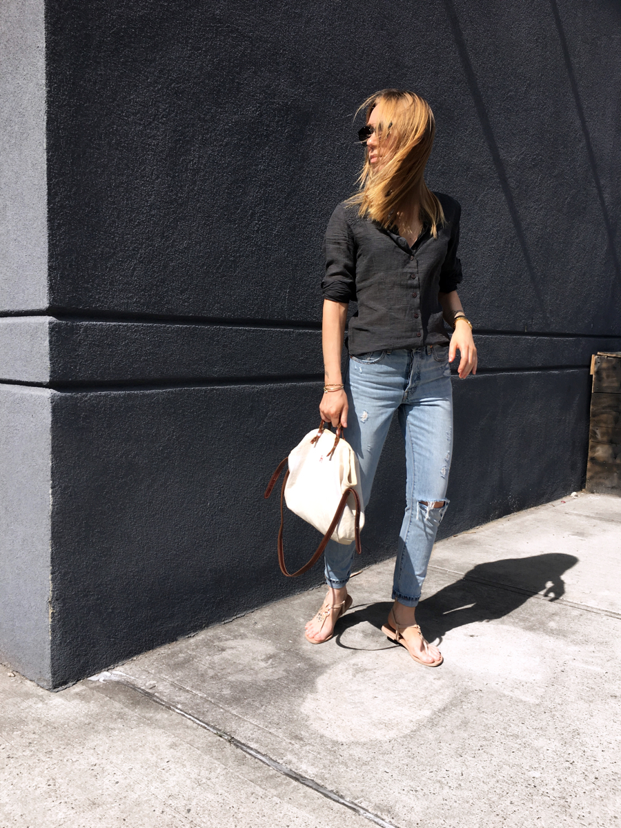 Woman posing for street style photo