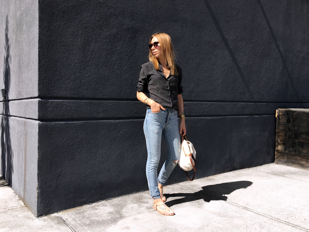 Woman looking sideways for outfit photo